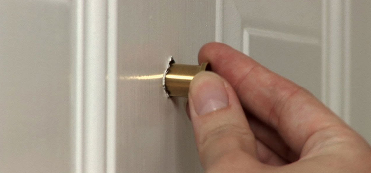 peephole door repair in Dewdney Place